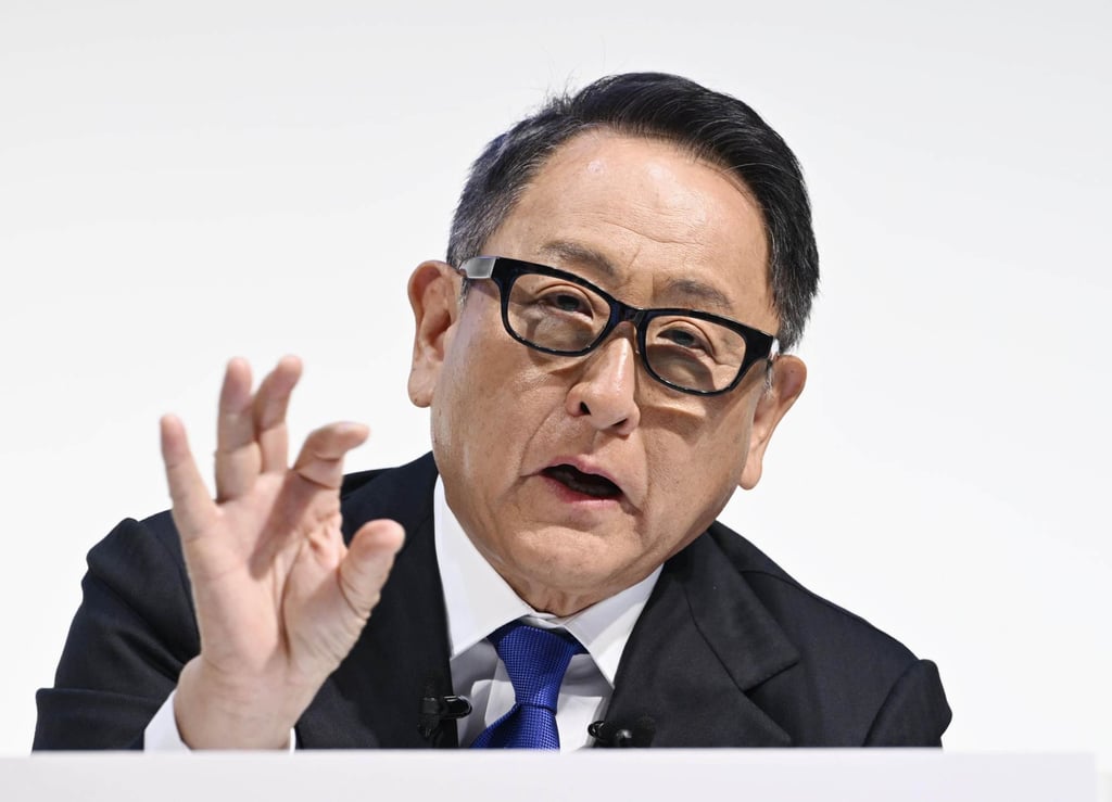 Toyota Chairman Akio Toyoda holds a press conference in Tokyo on Monday after the company improperly obtained vehicle certifications for seven models of car by conducting safety tests in ways not specified by the government. Photo: Kyodo