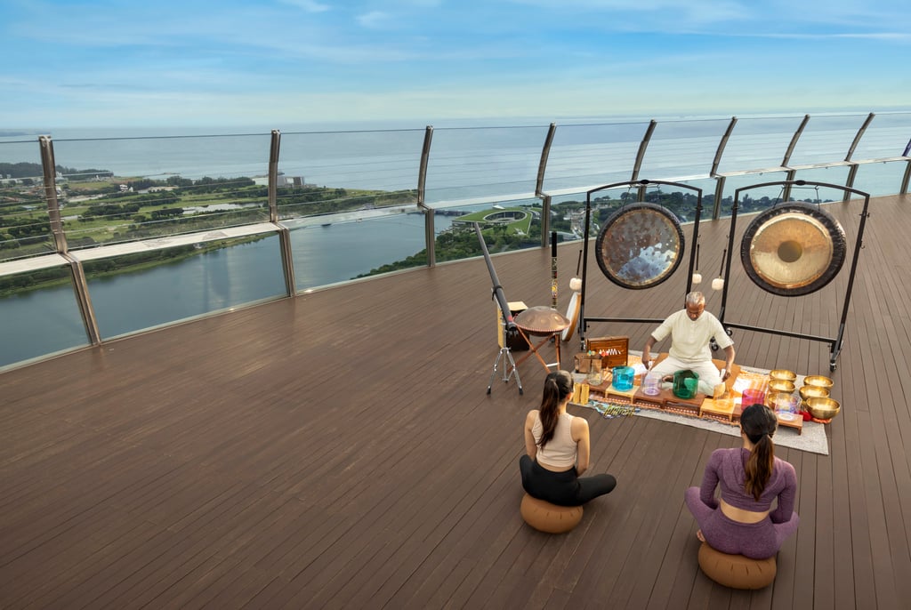 Where Mind and Body Connect by Marina Bay Sands features a line-up of morning classes that includes sound meditation, Pilates, Hatha yoga and Vinyasa yoga, held on the SkyPark Observation Deck at the integrated resort. Photo: Marina Bay Sands Where Mind and Body Connect by Marina Bay Sands features a line-up of morning classes that includes sound meditation, Pilates, Hatha yoga and Vinyasa yoga, held on the SkyPark Observation Deck at the integrated resort. Photo: Marina Bay Sands