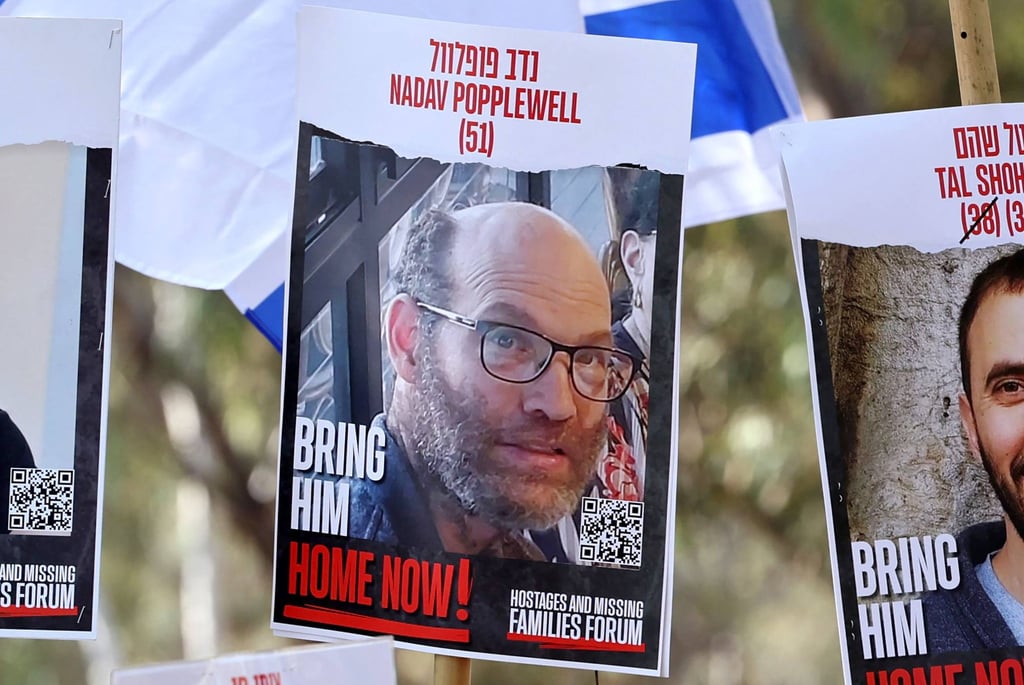 A poster portrait of hostage Nadav Popplewell. Photo: AFP A poster portrait of hostage Nadav Popplewell. Photo: AFP