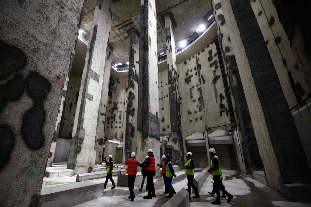 Visitors inside a River Seine water storage and treatment basin that aims to make the river cleaner. Photo: AFP Visitors inside a River Seine water storage and treatment basin that aims to make the river cleaner. Photo: AFP