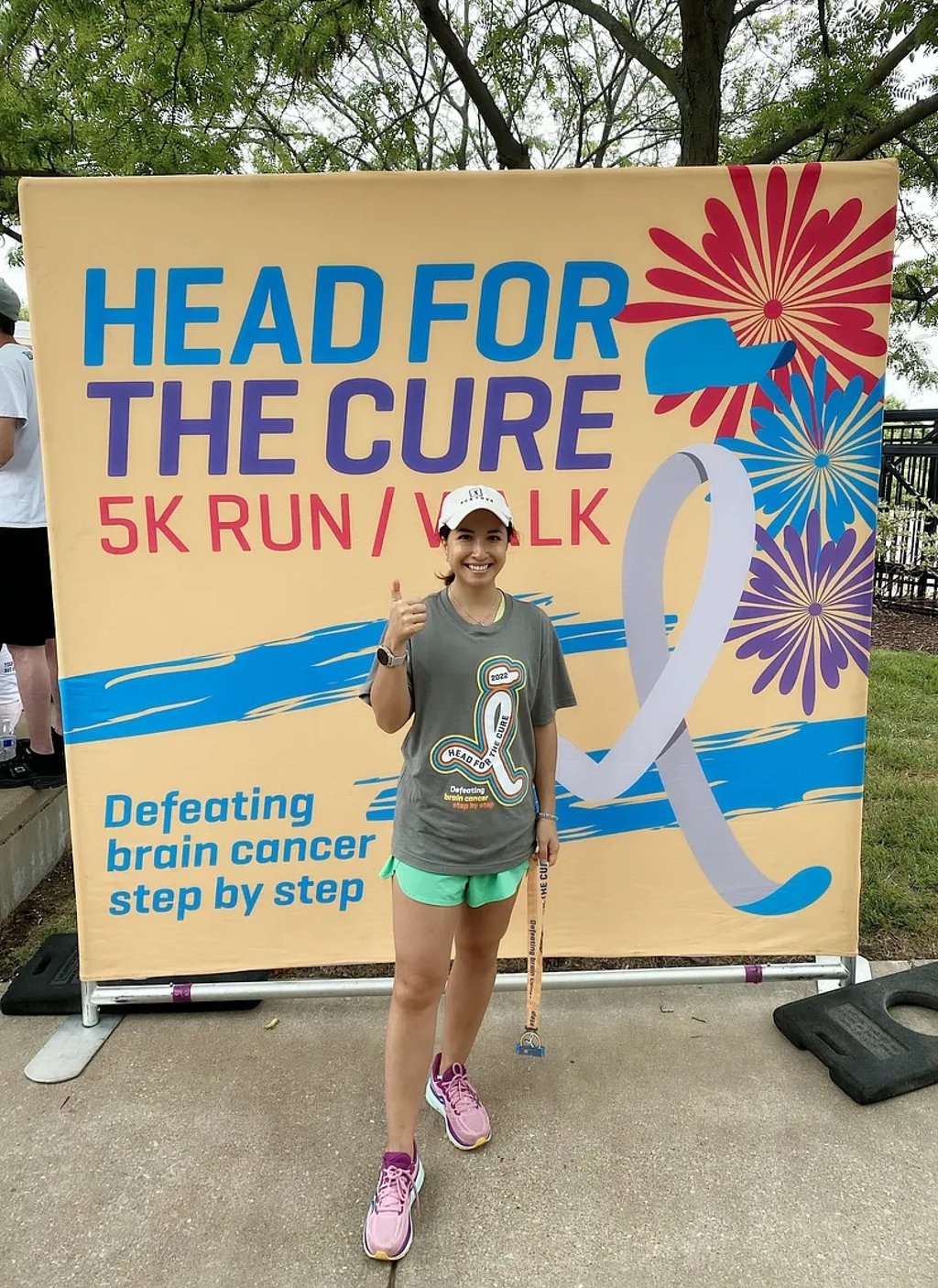 After surgery to remove a tangerine-sized tumour from her brain, and while she was having chemotherapy, Elaine Tsang took part in a fundraising walk for brain cancer in St Louis, Missouri. Photo: Elaine Tsang After surgery to remove a tangerine-sized tumour from her brain, and while she was having chemotherapy, Elaine Tsang took part in a fundraising walk for brain cancer in St Louis, Missouri. Photo: Elaine Tsang