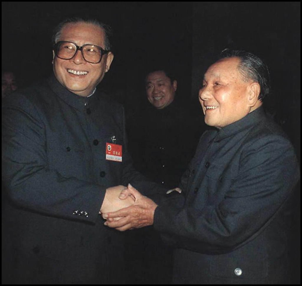 Chinese paramount leader Deng Xiaping (right) shakes hands with Chinese President Jiang Zemin at the end of the 14th Party Congress in Beijing in October 1992. Photo: AFP Chinese paramount leader Deng Xiaping (right) shakes hands with Chinese President Jiang Zemin at the end of the 14th Party Congress in Beijing in October 1992. Photo: AFP