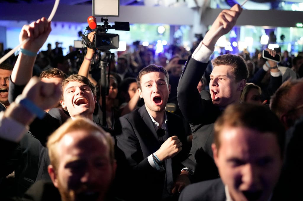Supporters of the French far-right National Rally in Paris. Photo: AP Supporters of the French far-right National Rally in Paris. Photo: AP