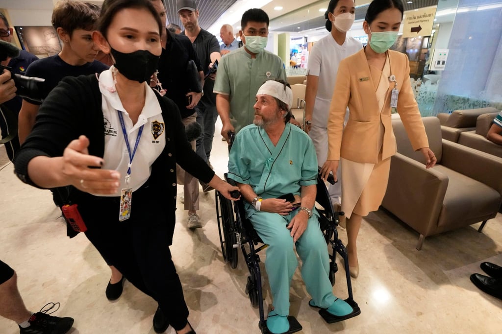 An Australian passenger who was injured on Singapore Airlines Flight SQ321 is seen at a hospital in Bangkok on May 23. Photo: AP An Australian passenger who was injured on Singapore Airlines Flight SQ321 is seen at a hospital in Bangkok on May 23. Photo: AP