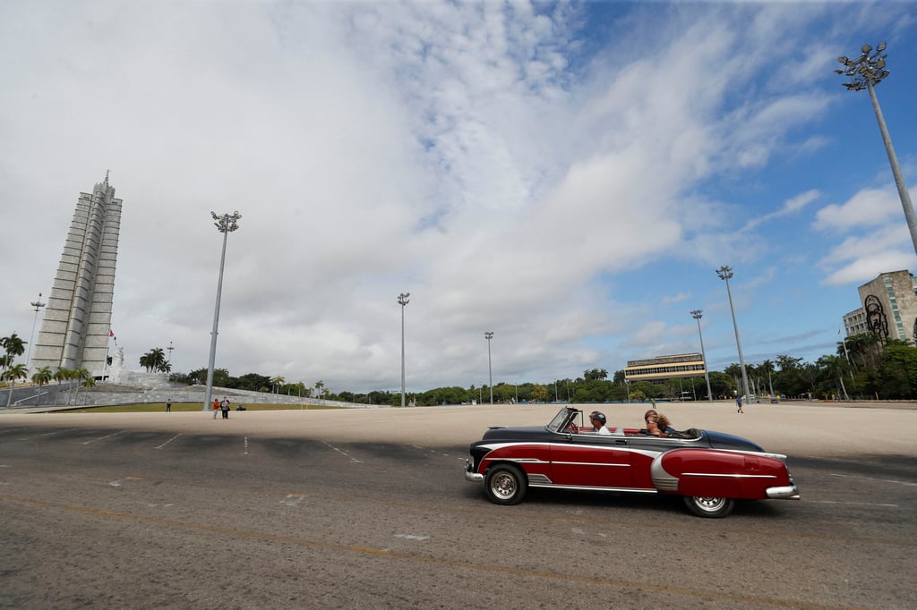 Tourists ride in a vintage car around Revolution Square in Havana, in June, 2024. Photo: Reuters Tourists ride in a vintage car around Revolution Square in Havana, in June, 2024. Photo: Reuters