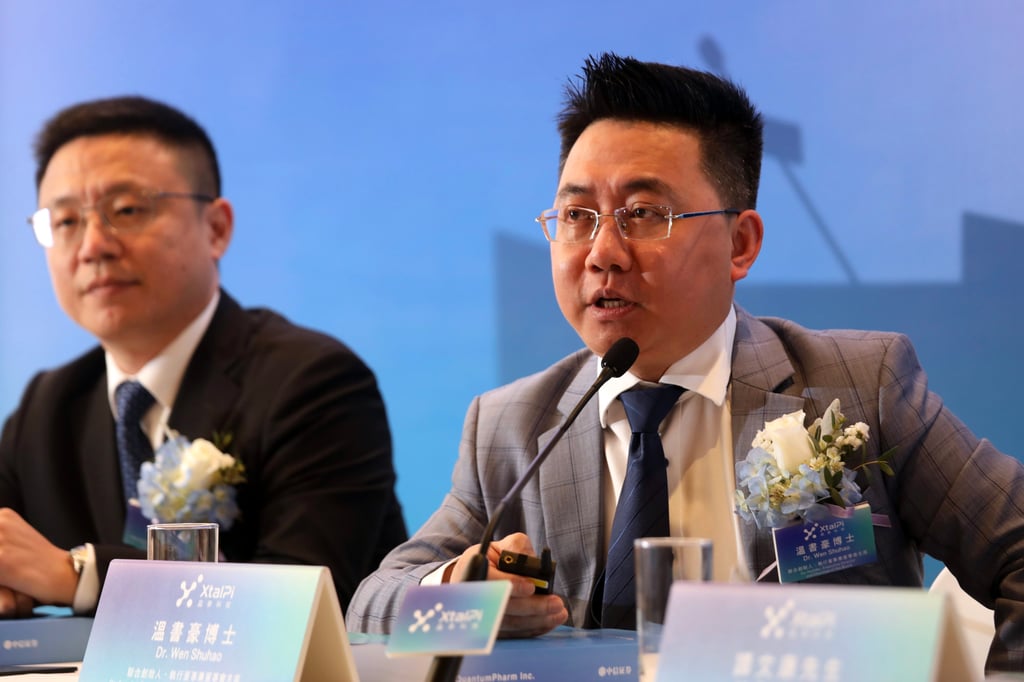 QuantumPharm co-founder and CEO Ma Jian (left) with co-founder and chairman Wen Shuhao at the company’s IPO press conference in Hong Kong on June 3. Photo: Xiaomei Chen