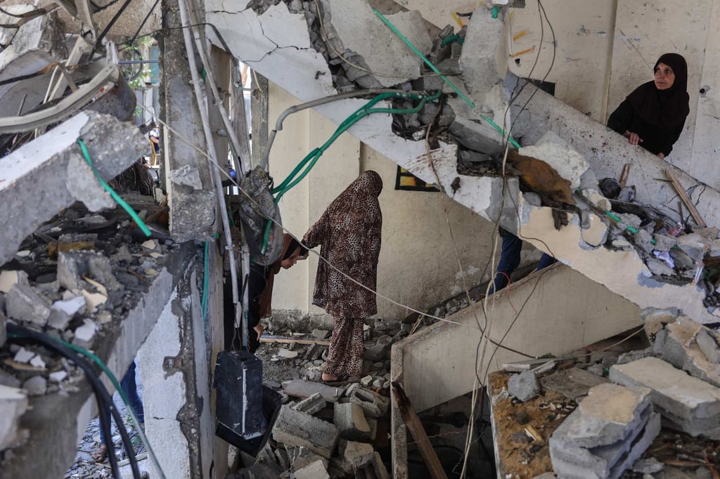 Palestinians inspect the damage in a house after an Israeli strike in Gaza City. Photo: AFP Palestinians inspect the damage in a house after an Israeli strike in Gaza City. Photo: AFP