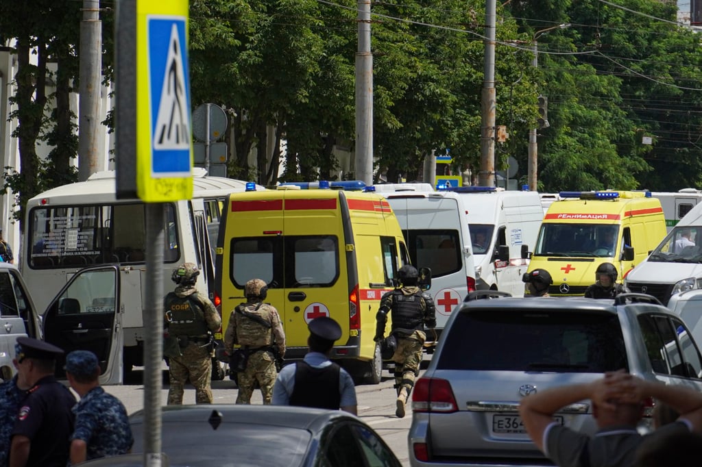 Russian policemen, Rosguardia servicemen and medical cars near a pretrial detention centre in Rostov-on-Don on Sunday. Photo: AP