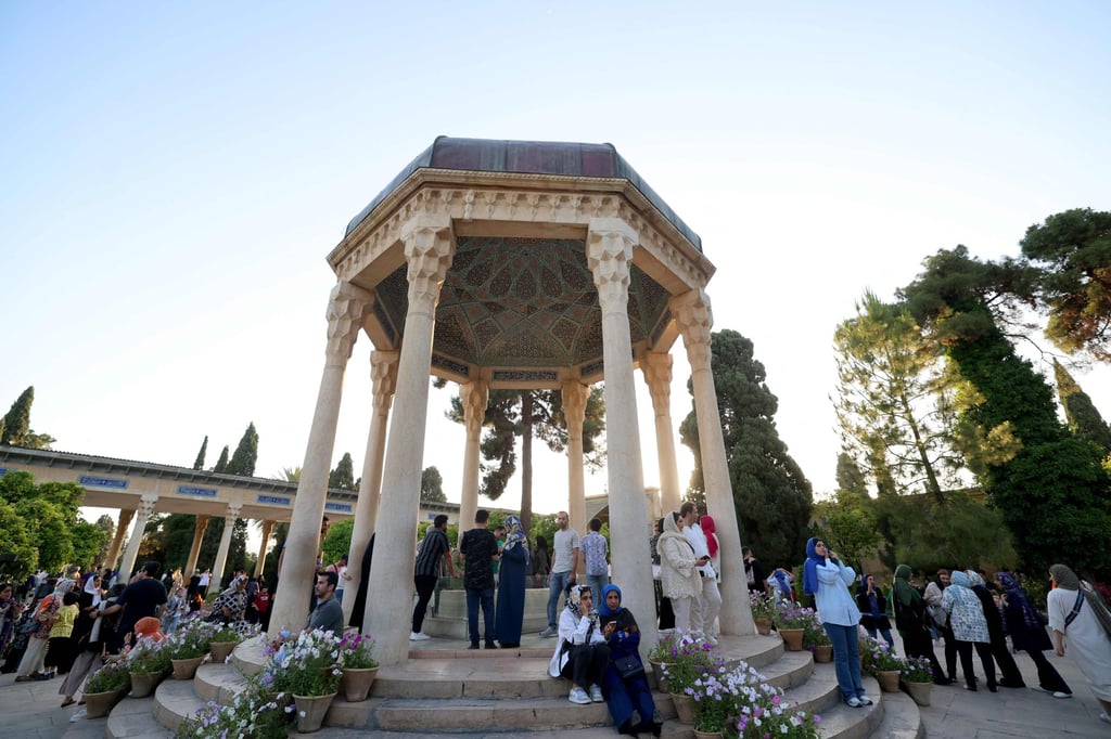 Iranians visit the tomb of Hafez. Photo: AFP Iranians visit the tomb of Hafez. Photo: AFP