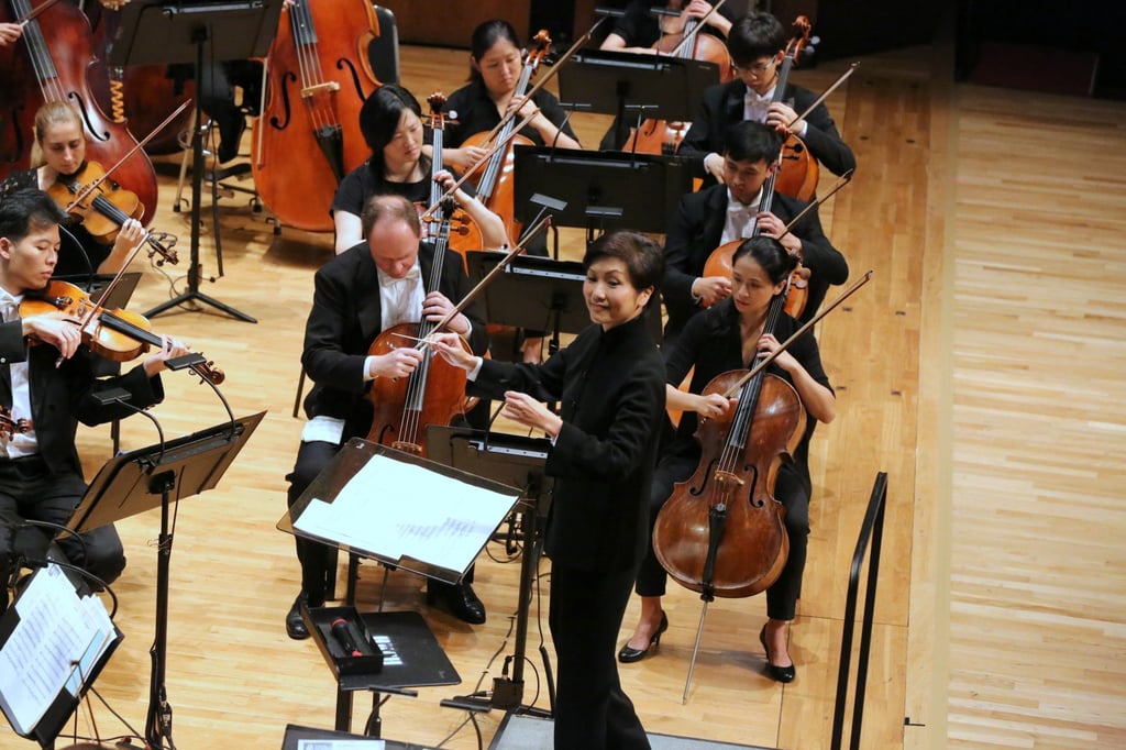 Yip Wing-sie, one of Yip Wai-hong’s three daughters and music director emeritus of the Hong Kong Sinfonietta, conducts the orchestra in 2022. Photo: Hong Kong Sinfonietta