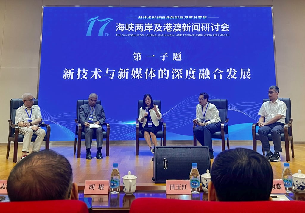 Post editor-in-chief Tammy Tam (centre) was among media professionals taking part in the forum. Photo: Denise Tsang