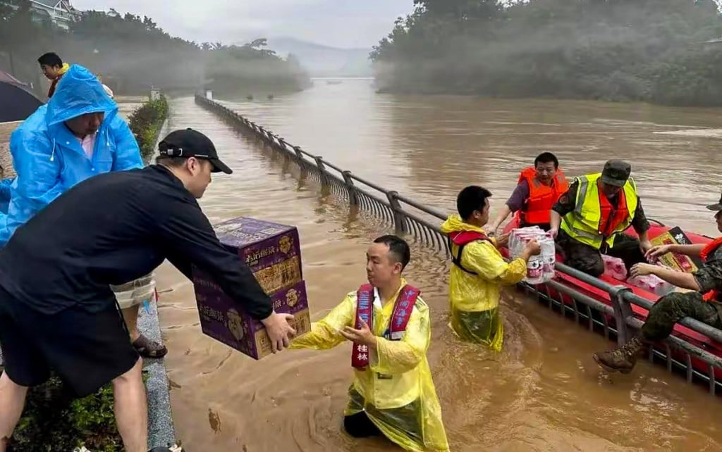 Authorities in Guilin, southern China, have sent food and emergency materials to trapped residents while others are evacuated where possible by boat. Photo: Weibo
