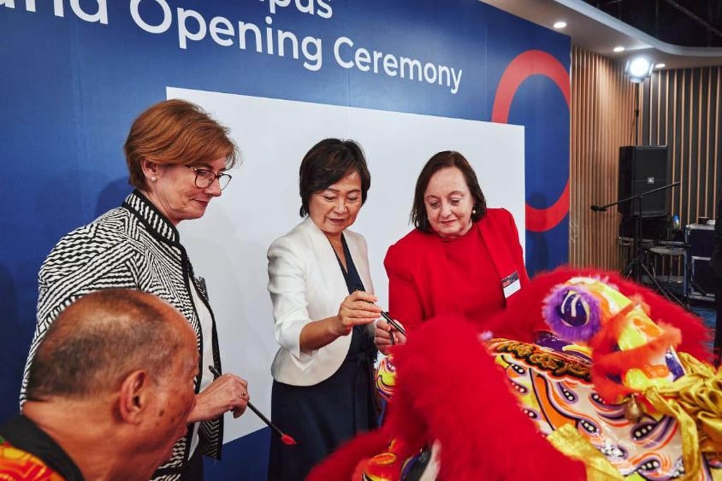 Hong Kong Secretary for Education Christine Choi Yuk-lin (centre) is flanked by Elizabeth Ward (left), former Australian consul-general in Hong Kong, and Patricia Davidson, vice-chancellor and president of the University of Wollongong, as they dot the eyes of a ceremonial dragon at last September’s official opening ceremony of UOW College Hong Kong’s new Tai Wai campus. Hong Kong Secretary for Education Christine Choi Yuk-lin (centre) is flanked by Elizabeth Ward (left), former Australian consul-general in Hong Kong, and Patricia Davidson, vice-chancellor and president of the University of Wollongong, as they dot the eyes of a ceremonial dragon at last September’s official opening ceremony of UOW College Hong Kong’s new Tai Wai campus.