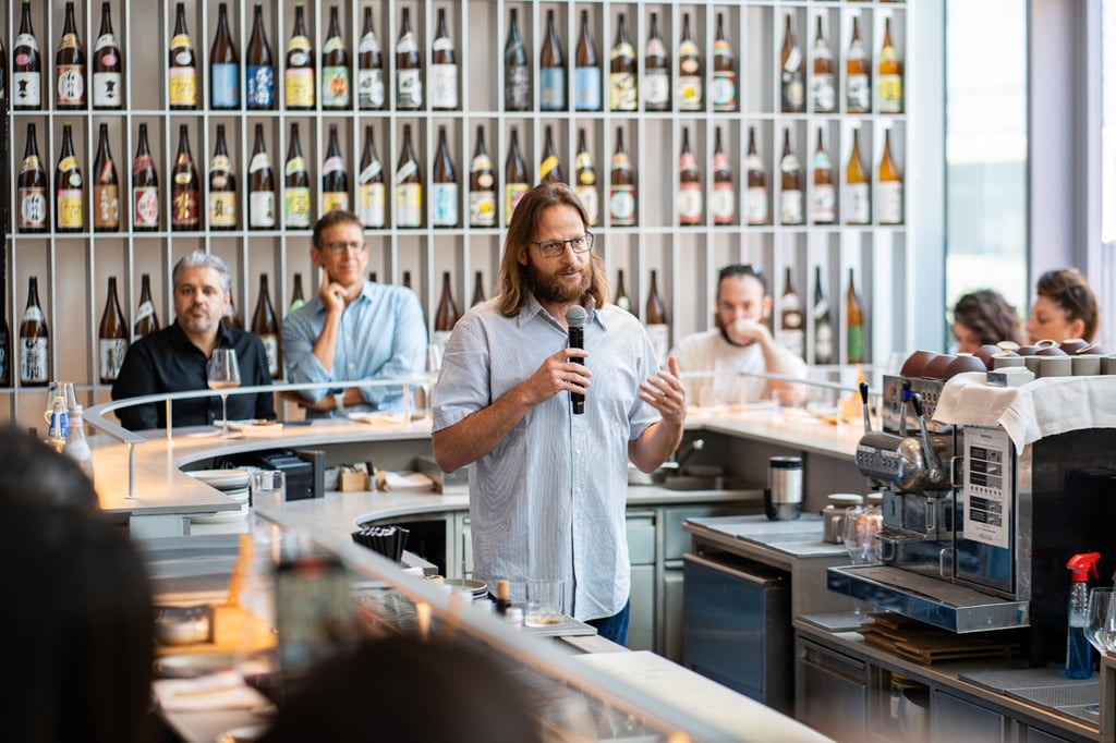 ‘Once we decided that eel was our first market, our focus immediately shifted to the [Asia-Pacific] region where the largest market for this fish is,’ said Forsea co-founder and CEO Roee Nir, pictured speaking at a tasting event in Tel-Aviv. Photo: Liran Maimon