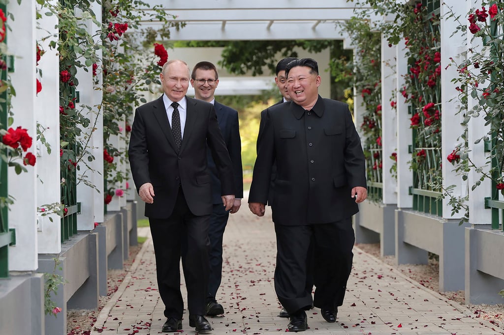 Russia’s Vladimir Putin and North Korean leader Kim Jong-un share a light moment while walking through a garden at Kumsusan State Guest House in Pyongyang on Wednesday. Photo: Korean Central News Agency/Korea News Service via AP Russia’s Vladimir Putin and North Korean leader Kim Jong-un share a light moment while walking through a garden at Kumsusan State Guest House in Pyongyang on Wednesday. Photo: Korean Central News Agency/Korea News Service via AP