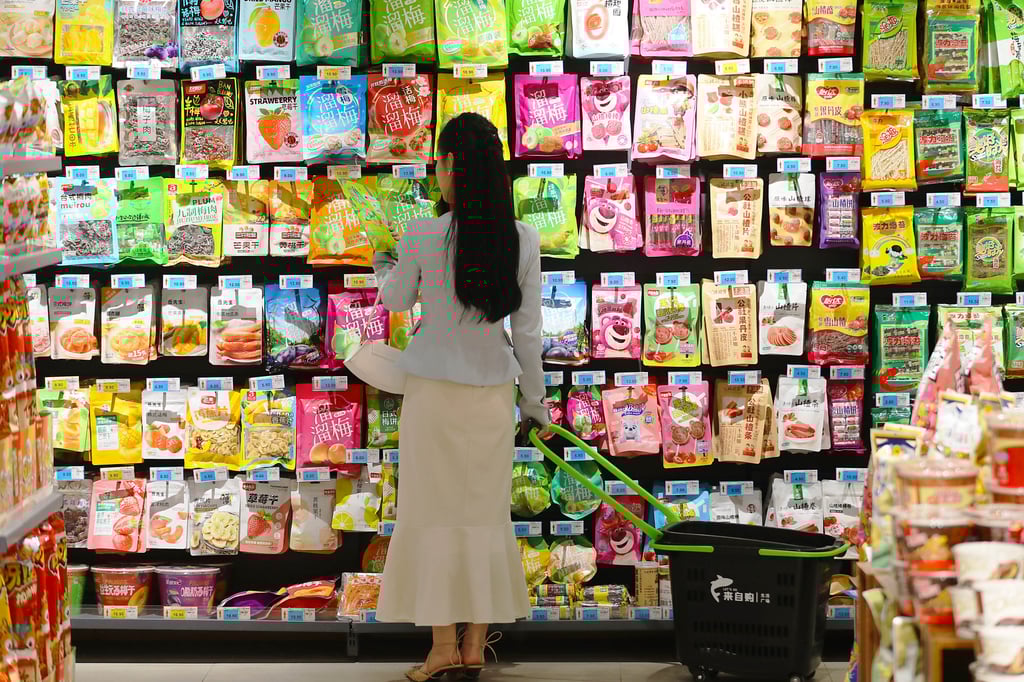 A shopper looks at a product in a supermarket in Tengzhou, Shandong province on April 11. The recovery of consumption spending in China is falling short of expectations. Photo: Xinhua A shopper looks at a product in a supermarket in Tengzhou, Shandong province on April 11. The recovery of consumption spending in China is falling short of expectations. Photo: Xinhua
