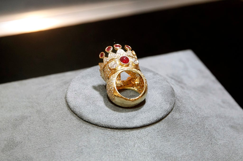 A gold, ruby and diamond crown ring, designed and commissioned by Tupac Shakur, on display before it went under the hammer at Sotheby’s New York in July 2023. Drake bought the ring for just over US$1 million. Photo: EPA-EFE