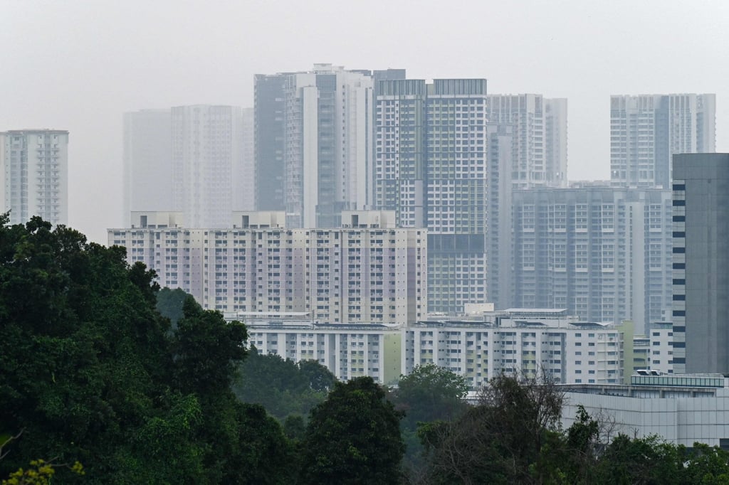 Apartment blocks in Singapore are seen shrouded by rain. The city state’s government is seeking to tackle a major surge in residential rents. Photo: AFP Apartment blocks in Singapore are seen shrouded by rain. The city state’s government is seeking to tackle a major surge in residential rents. Photo: AFP