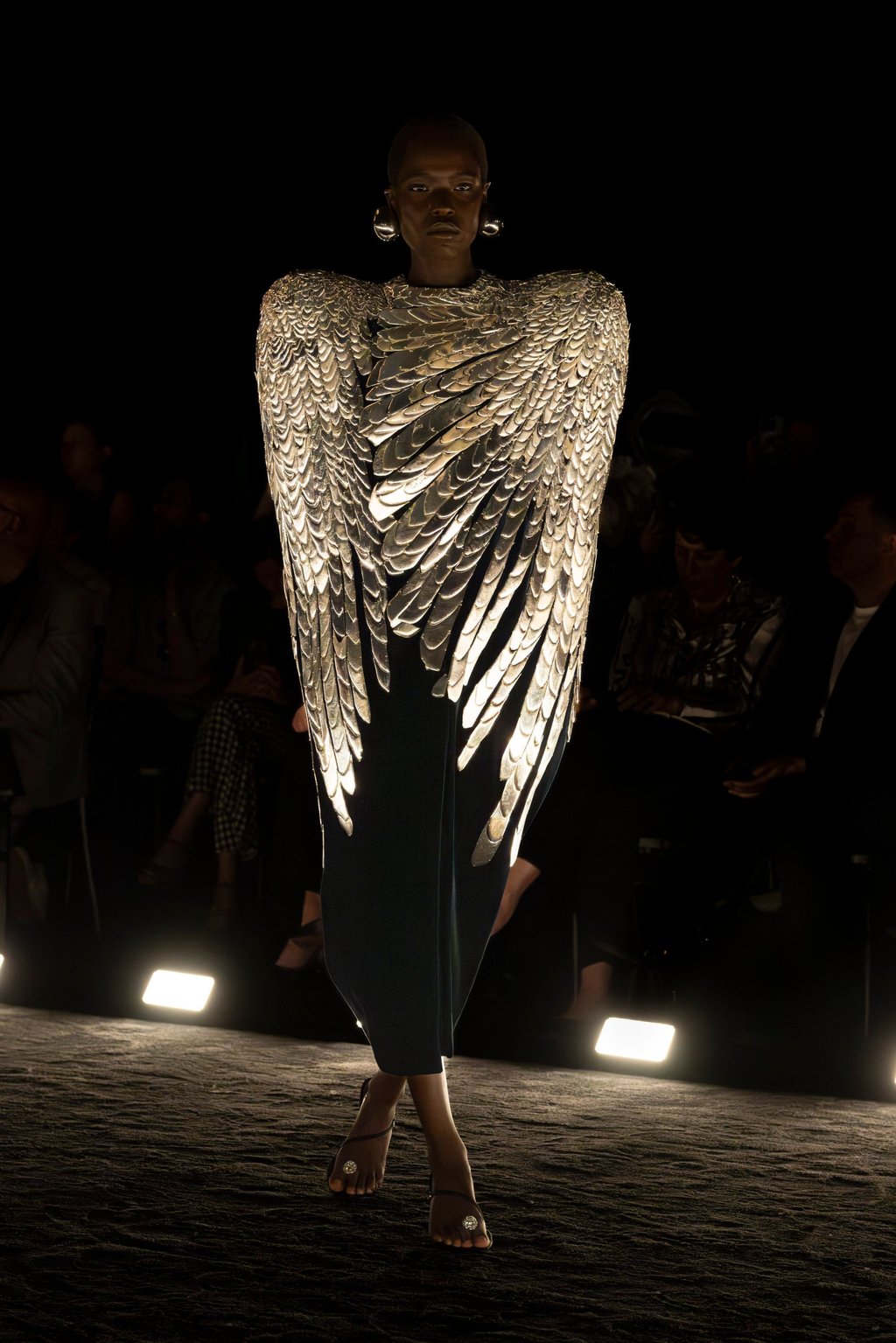 An embroidered velvet cape from the Schiaparelli haute couture autumn/winter 2024-25 show in Paris An embroidered velvet cape from the Schiaparelli haute couture autumn/winter 2024-25 show in Paris