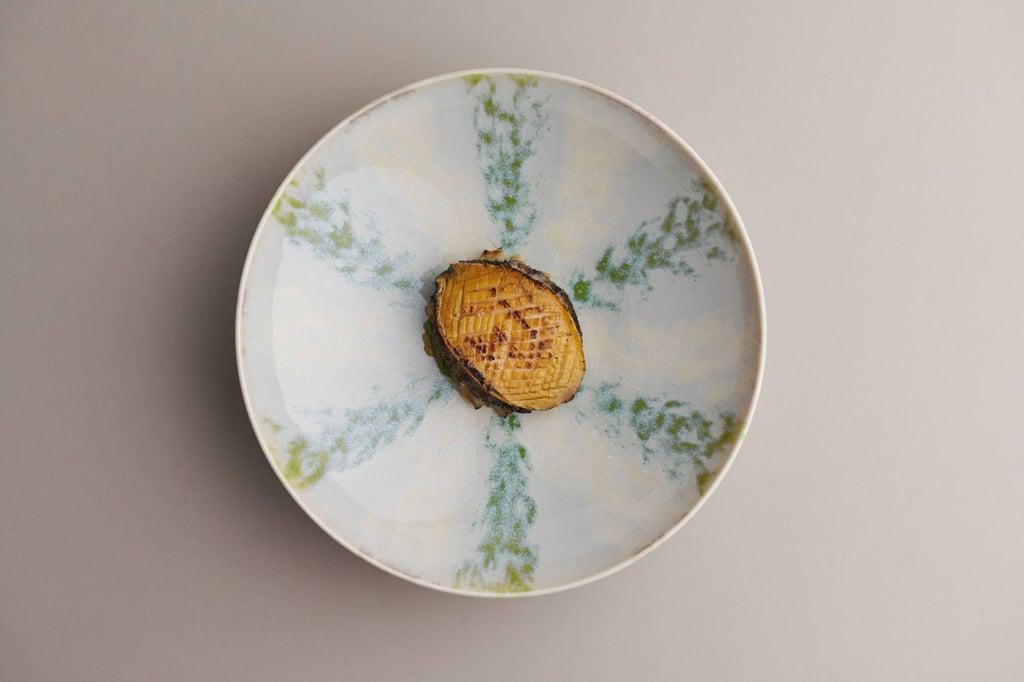 A dish served at Meta, the only restaurant elevated to two-Michelin-star status in the Michelin Guide Singapore 2024. Five other restaurants kept their two stars, but another was demoted. Photo: Meta