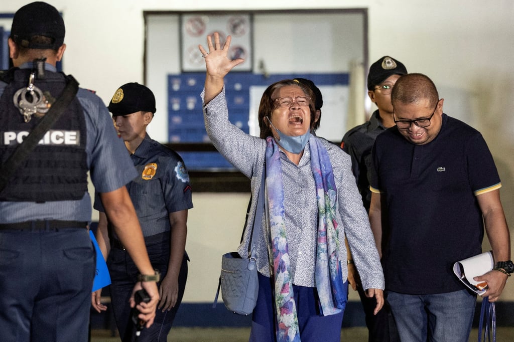 Former Philippines senator Leila de Lima waves as she walks out of the Philippine National Police custodial centre after being granted bail following over six years in detention on November 13. Photo: Reuters