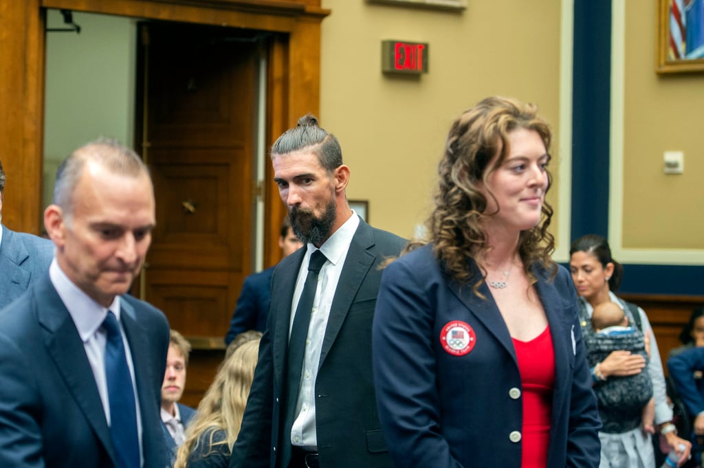 Usada chief Travis Tygart, Phelps and Schmitt arrive for the US Congressional hearing on Tuesday. Photo: AP