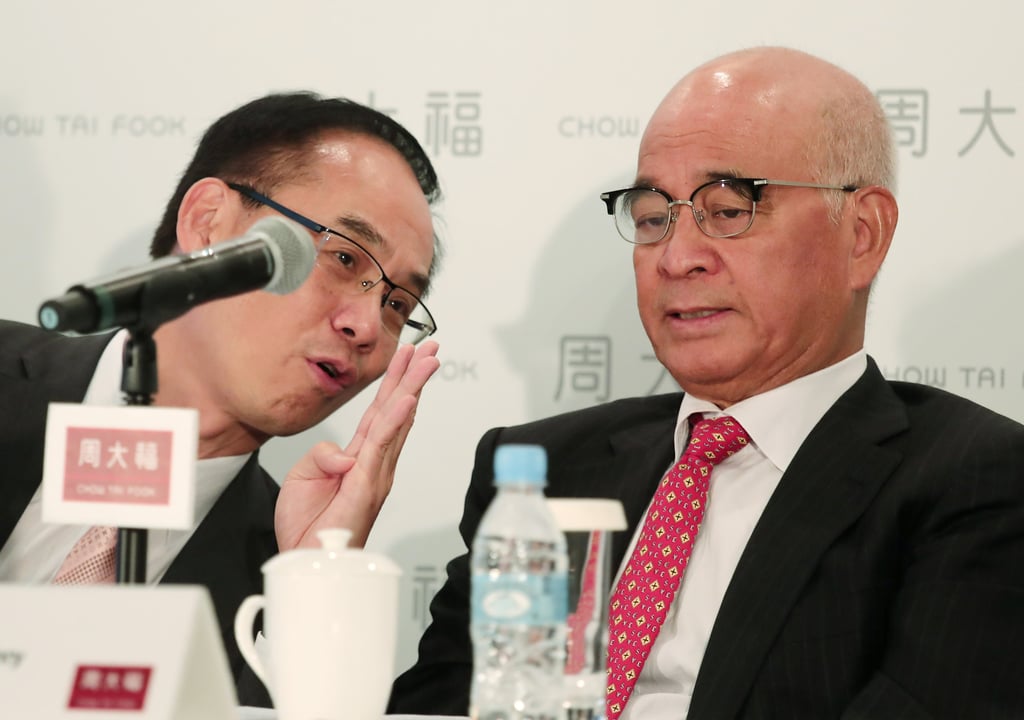 Hong Kong conglomerate New World Development is controlled by the family of Henry Cheng Kar-shun (right). Photo: Jonathan Wong