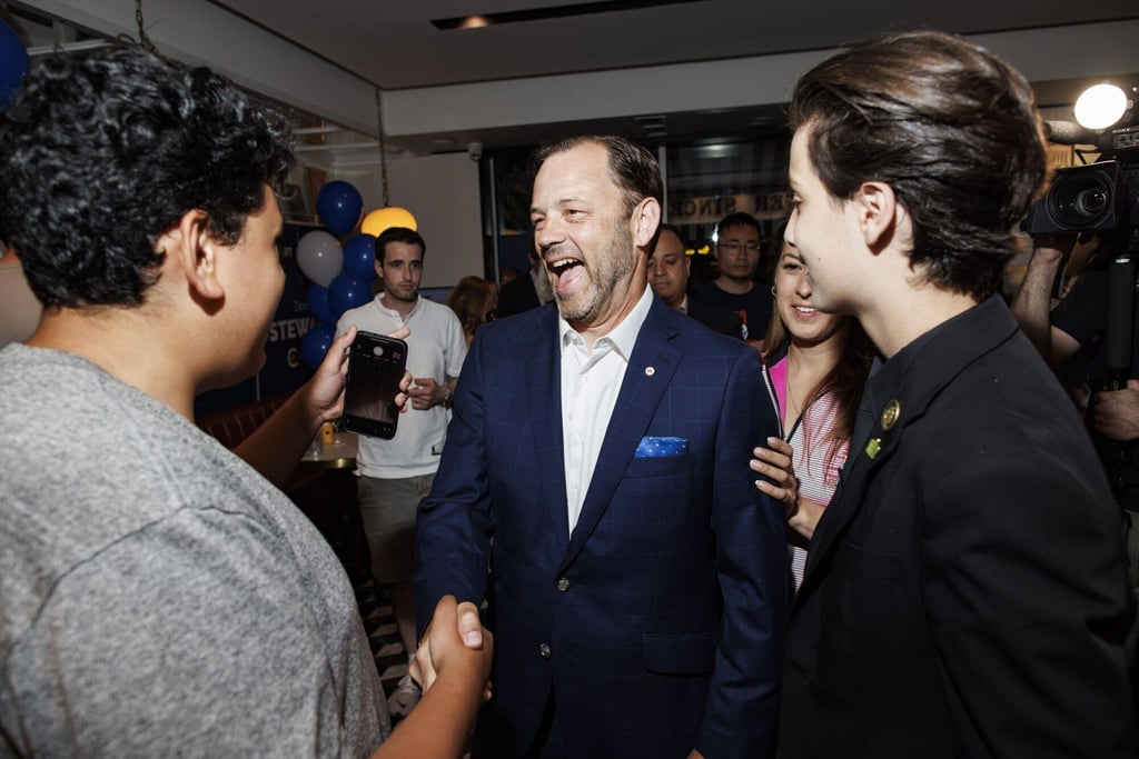 Don Stewart (centre), Conservative candidate for Toronto-St Paul’s, greets supporters in Toronto on Monday. Photo: Bloomberg Don Stewart (centre), Conservative candidate for Toronto-St Paul’s, greets supporters in Toronto on Monday. Photo: Bloomberg