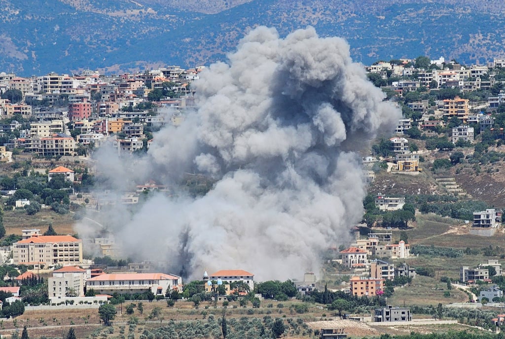 Smoke rises from the southern Lebanese town of Khiam amid cross-border hostilities between Hezbollah and Israel. Photo: Reuters Smoke rises from the southern Lebanese town of Khiam amid cross-border hostilities between Hezbollah and Israel. Photo: Reuters