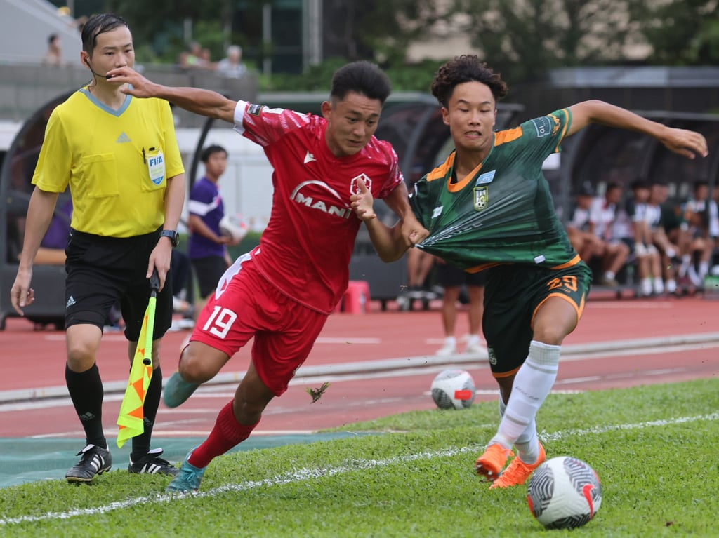 Defender Liang Ngai-tung (right) has been charged by the ICAC. Photo: Yik Yeung-man Defender Liang Ngai-tung (right) has been charged by the ICAC. Photo: Yik Yeung-man