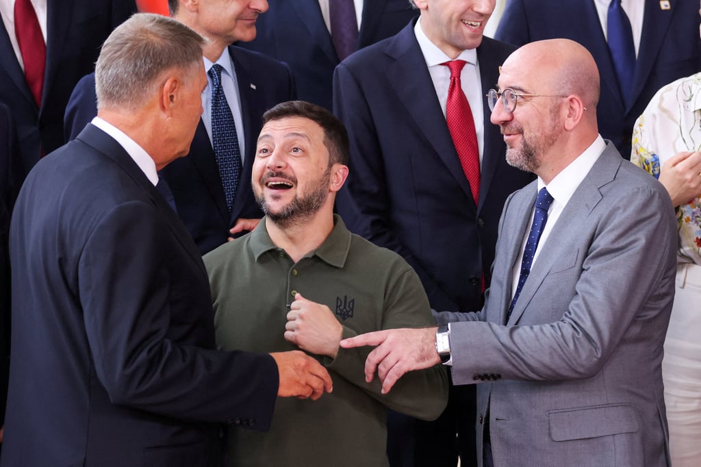Ukraine’s President Volodymyr Zelensky (centre) and European Council President Charles Michel (right) attend a European Union leaders’ summit in Brussels, Belgium, on Thursday. Photo: Reuters