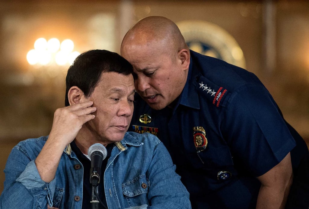Then-Philippine President Rodrigo Duterte (left) with Philippine National Police (PNP) director general Ronald Dela Rosa in 2017. Photo: AFP
