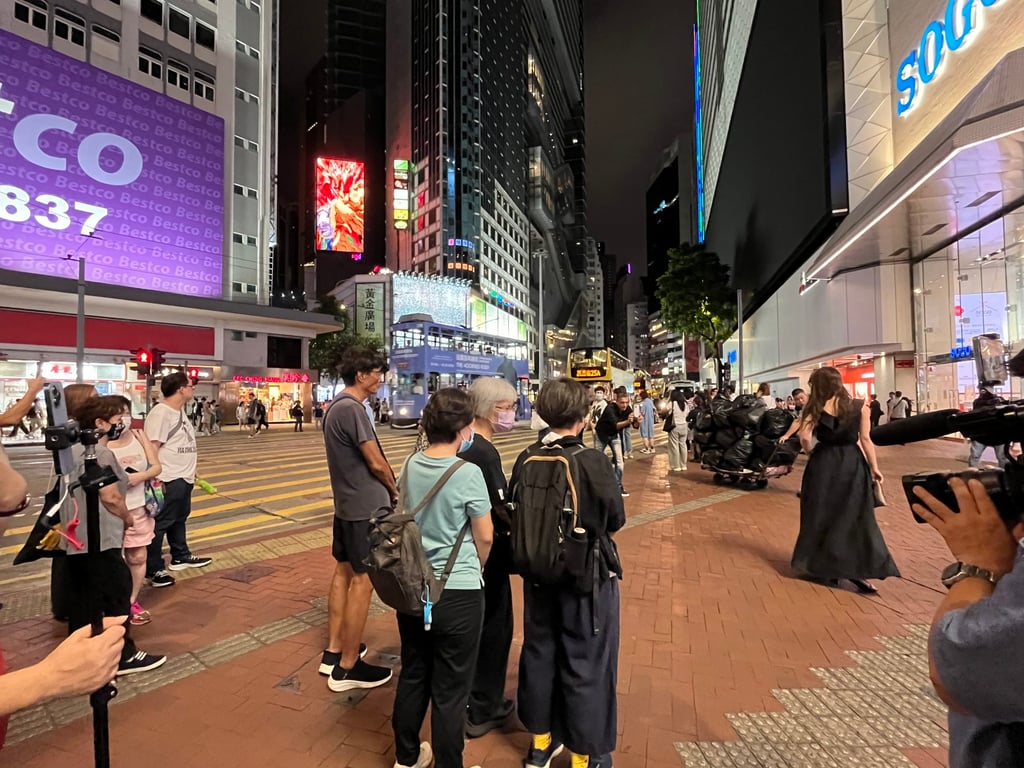 A group stood silently outside Sogo on Monday evening. Photo: Emily Hung A group stood silently outside Sogo on Monday evening. Photo: Emily Hung