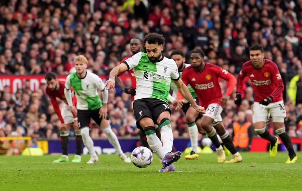 Liverpool’s Mohamed Salah scores from the penalty spot during an English Premier League match between Manchester United and Liverpool at Old Trafford. Photo: DPA Liverpool’s Mohamed Salah scores from the penalty spot during an English Premier League match between Manchester United and Liverpool at Old Trafford. Photo: DPA