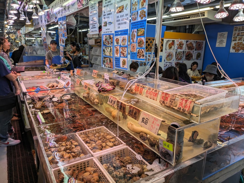 Tomari Iyumachi, on Naha’s harbourfront, is a small wholesale seafood market stocked with everything from tuna eyeballs to horse sashimi as well as local delicacies. Photo: Fiona Ching