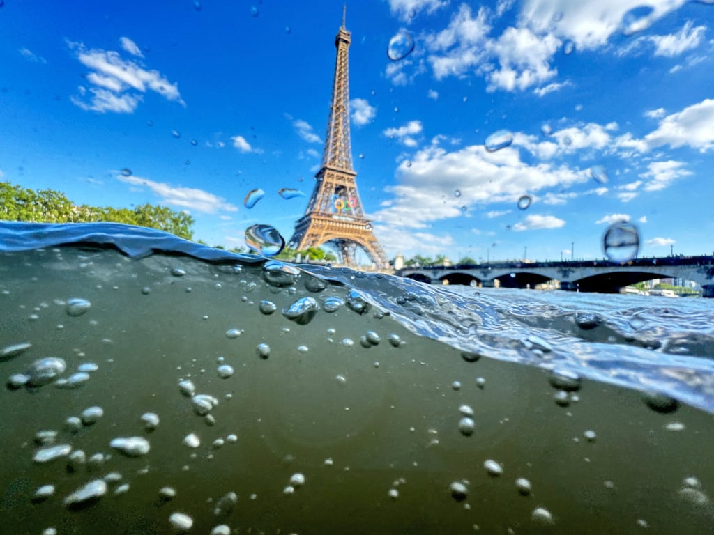 Rainfall, the UV index, water temperature, river flow all affect the level of pollution in the Seine River. Photo: Reuters