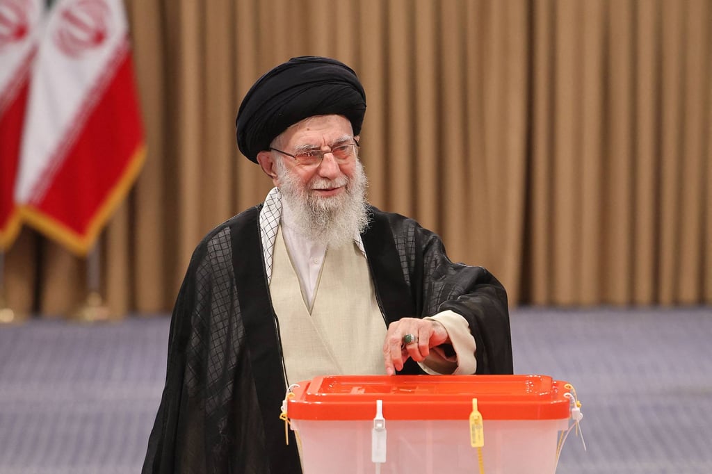 Iran’s supreme leader Ayatollah Ali Khamenei casts his ballot. Photo: AFP