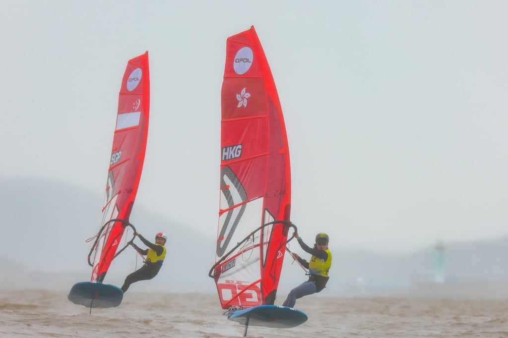 Ma Kwan-ching (right) competes in the women’s windsurfing iQFoil race at the Hangzhou Asian Games. Photo: Xinhua Ma Kwan-ching (right) competes in the women’s windsurfing iQFoil race at the Hangzhou Asian Games. Photo: Xinhua
