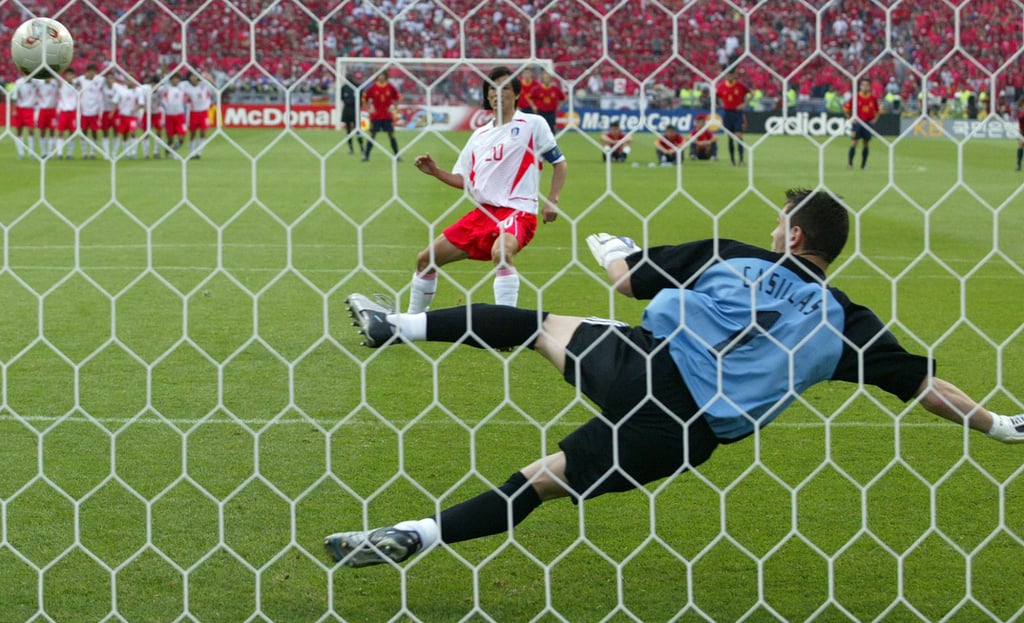 South Korea’s Hong Myung-bo scores the winning penalty against Spain during the quarter-finals of the 2002 World Cup. Photo: Reuters