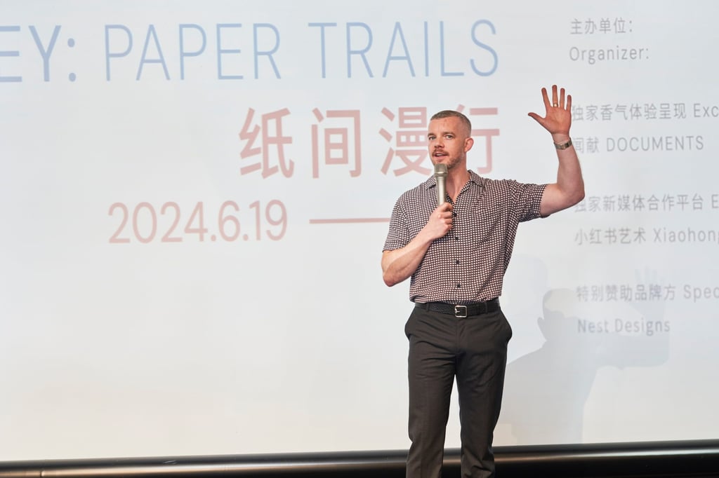 Tovey addresses visitors at the opening of David Hockney: Paper Trails, an exhibition he co-curated at Shanghai’s Modern Art Museum. Photo: Cheung Hok-hang