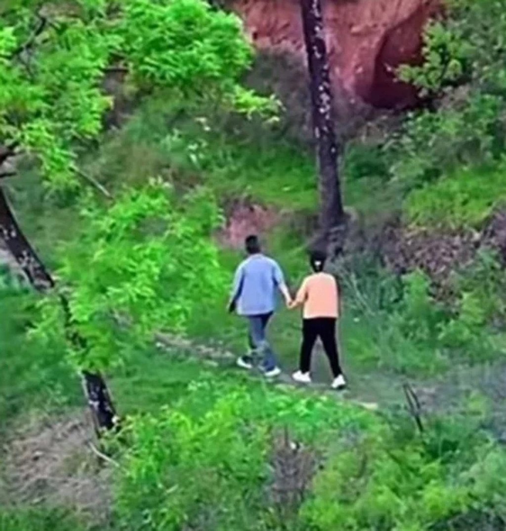 Drone footage obtained by Jing captured his wife and her boss walking away from their secret love nest hand in hand. Photo: chinapress Drone footage obtained by Jing captured his wife and her boss walking away from their secret love nest hand in hand. Photo: chinapress
