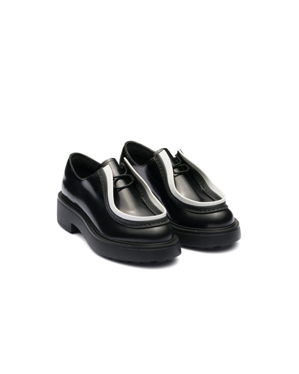 Prada shoes (US$1,390)