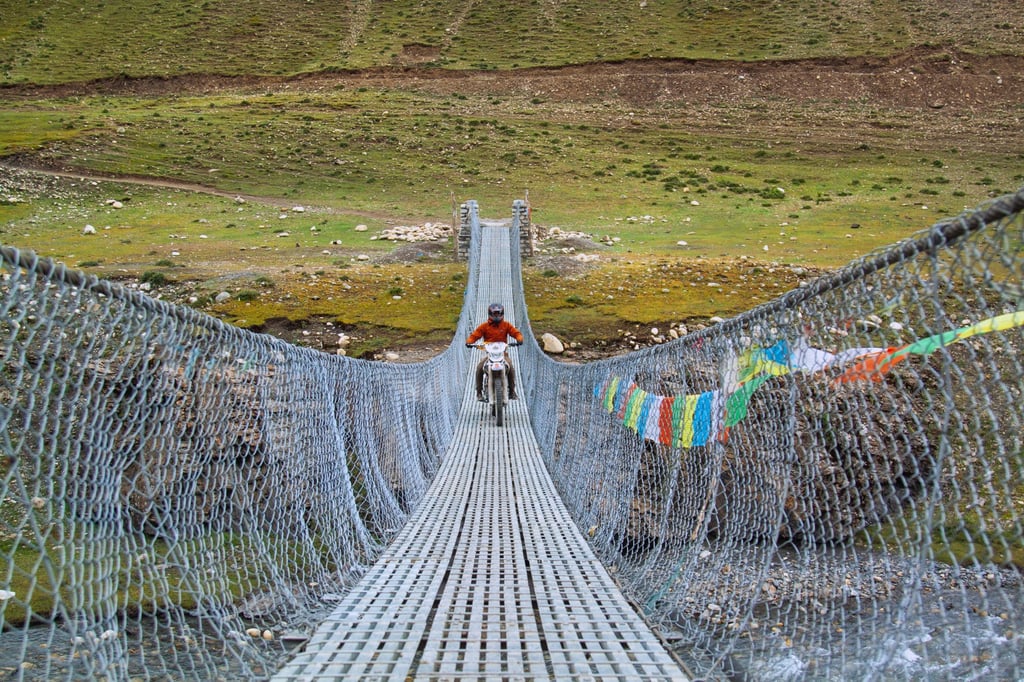 Riding over the Tarap River in remote Dolpo, northwest Nepal. Photo: Neelima Vallangi