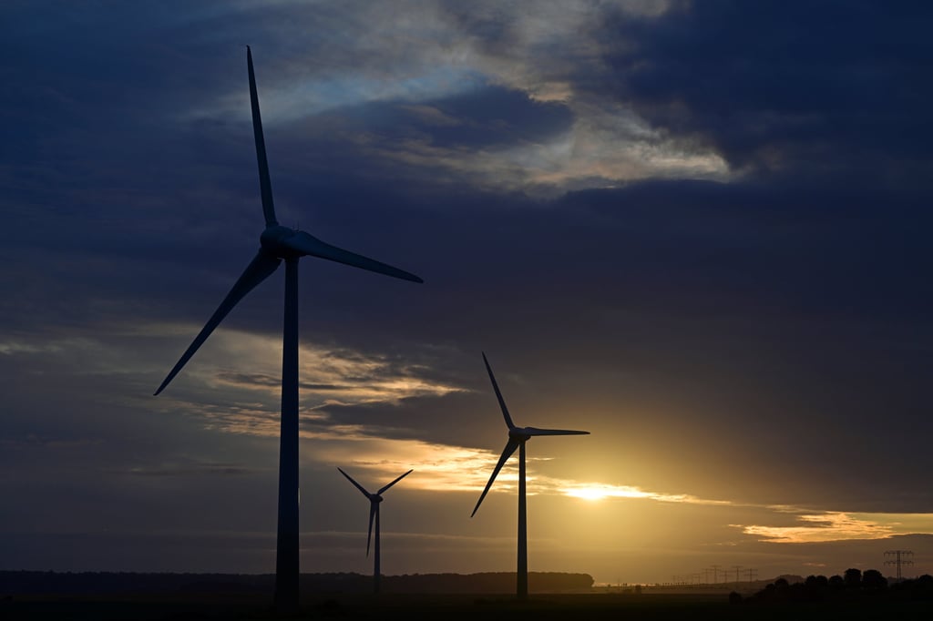 Wind turbines at sunrise in the city of Erfurt in central Germany last week. Photo: dpa