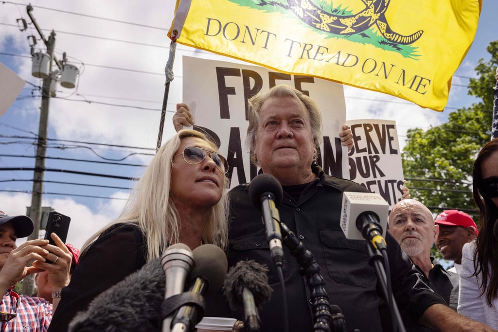 Former White House chief strategist Steve Bannon and Republican US Representative Marjorie Taylor Greene speaking during a press conference outside Danbury Federal Correctional Institution. Photo: AFP Former White House chief strategist Steve Bannon and Republican US Representative Marjorie Taylor Greene speaking during a press conference outside Danbury Federal Correctional Institution. Photo: AFP