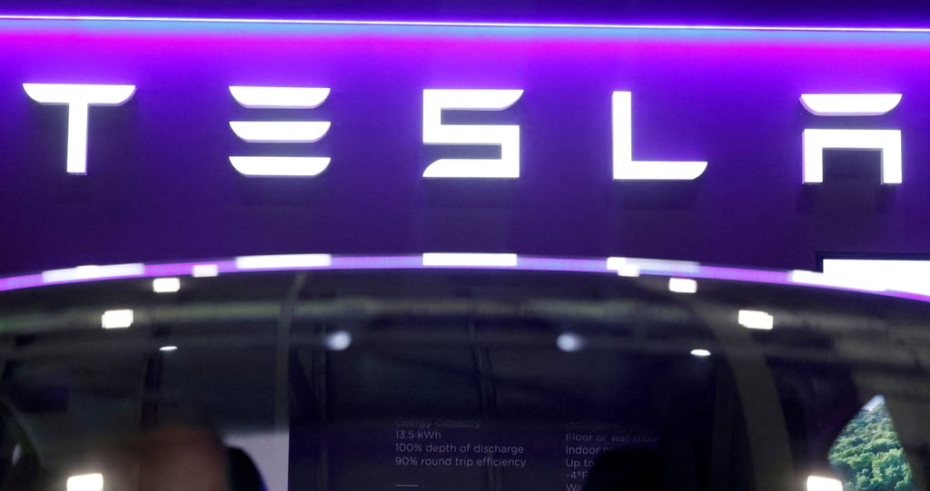 The logo of Tesla on display at the Everything Electric exhibition in London, March 28, 2024. Photo: Reuters