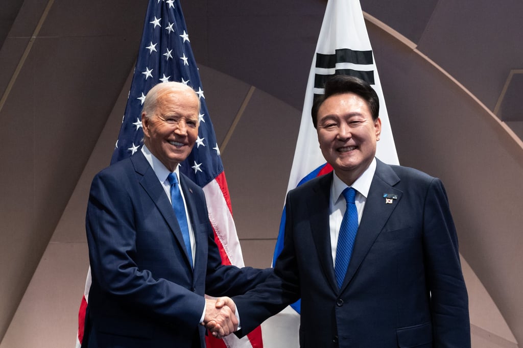 US President Joe Biden shakes hands with South Korean President Yoon Suk-yeol at their meeting in Washington on Thursday. Photo: Yonhap/dpa