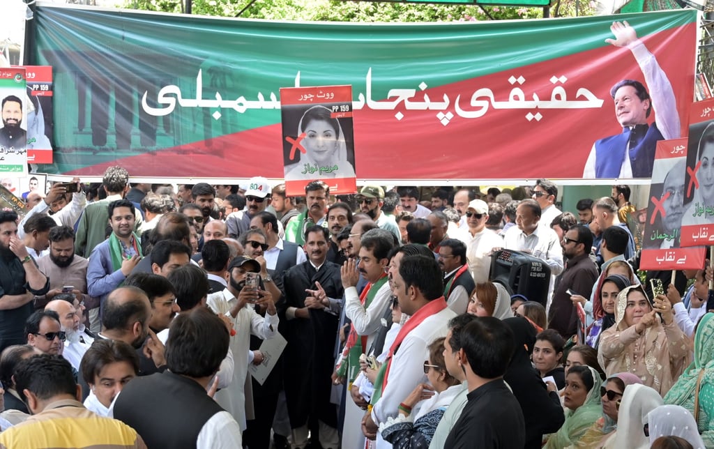 Supporters of former prime minister Imran Khan celebrate after a court verdict overturned Khan’s illegal marriage conviction. Photo: EPA-EFE Supporters of former prime minister Imran Khan celebrate after a court verdict overturned Khan’s illegal marriage conviction. Photo: EPA-EFE