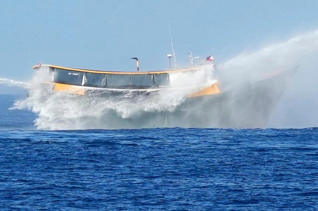 Philippine resupply vessel Unaizah May 4 is hit by two Chinese coastguard water canons as it tried to enter the Second Thomas Shoal in the disputed South China Sea on March 5, 2024. Photo: AP