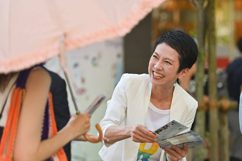 Japanese politician Renho Saito hands out campaign fliers in Tokyo on July 4 during her gubernatorial campaign to unseat the city’s governor, Yuriko Koike. Photo: Bloomberg
